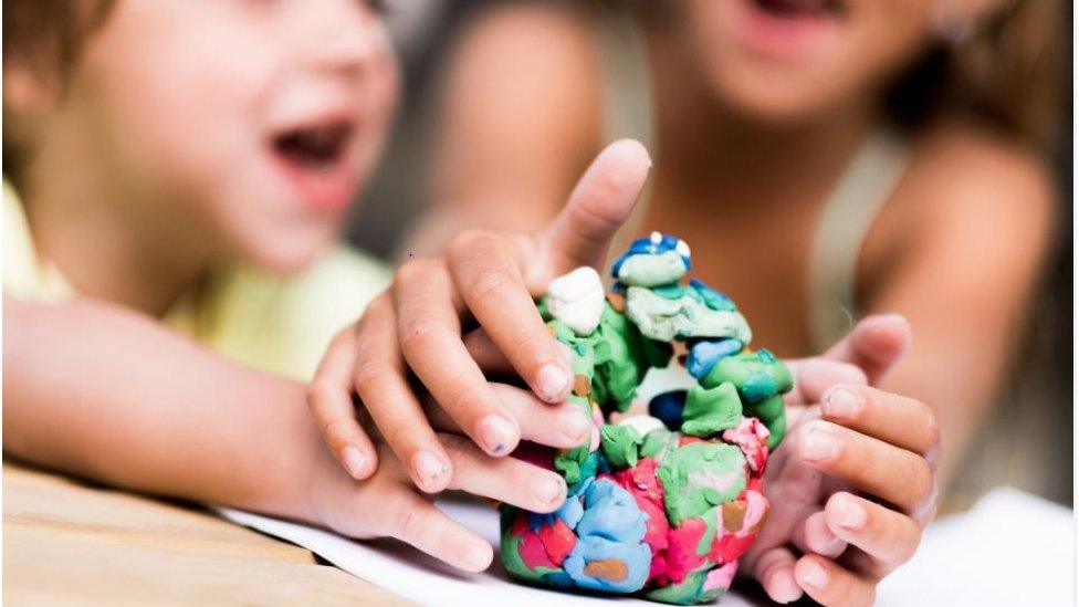 Children with plasticine