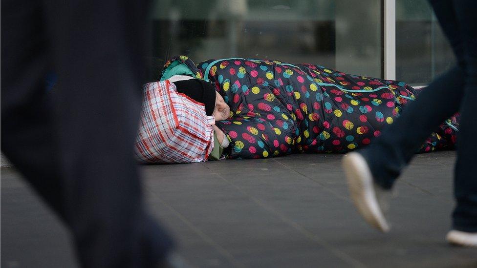 Homeless man on street