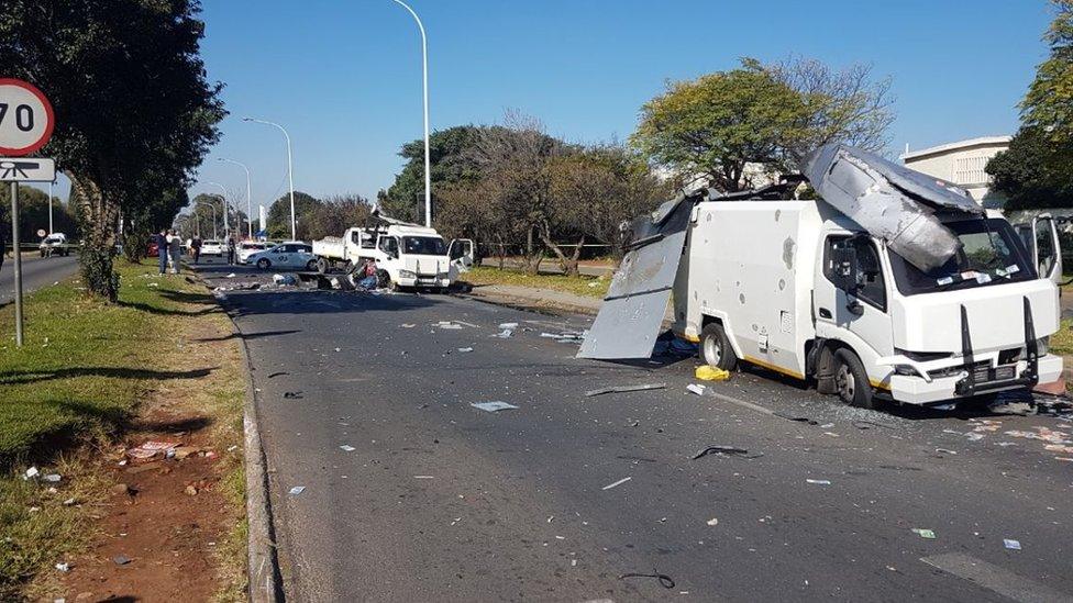 A picture showing a partially destroyed cash-in-transit van in Benoni