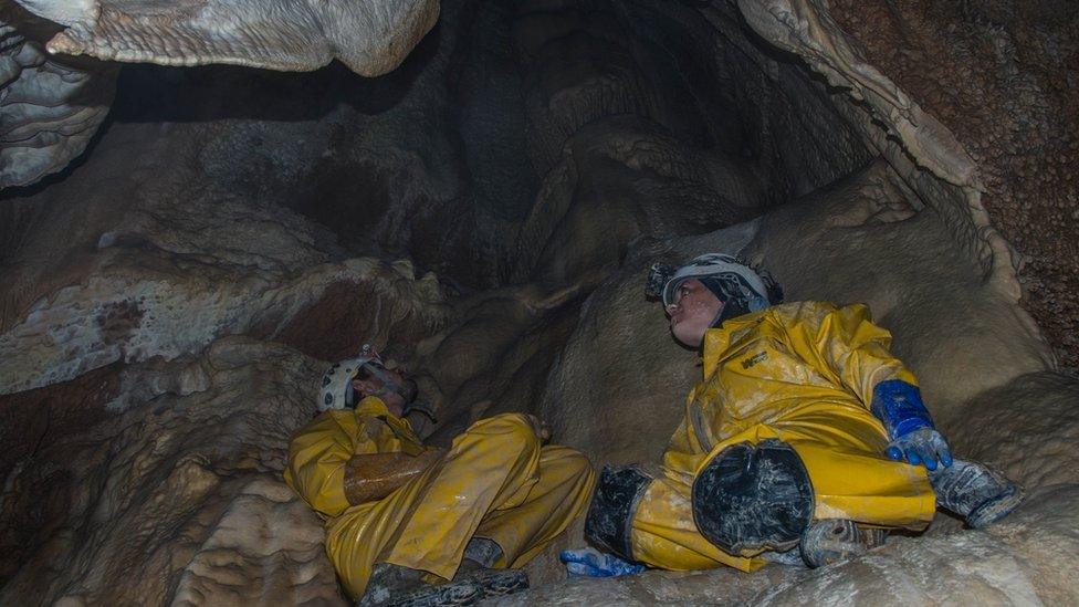 Two cavers inside Boybuloq