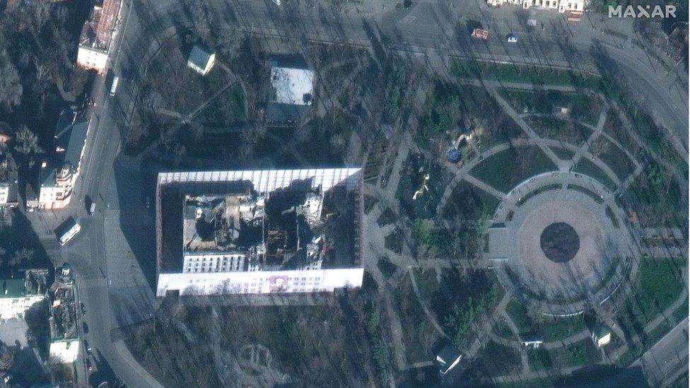 This satellite picture from 2 December shows the screen erected around the theatre