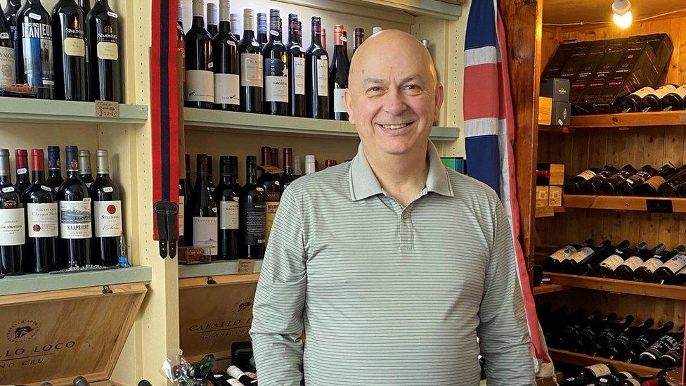 Gerard Richardson inside his wine shop