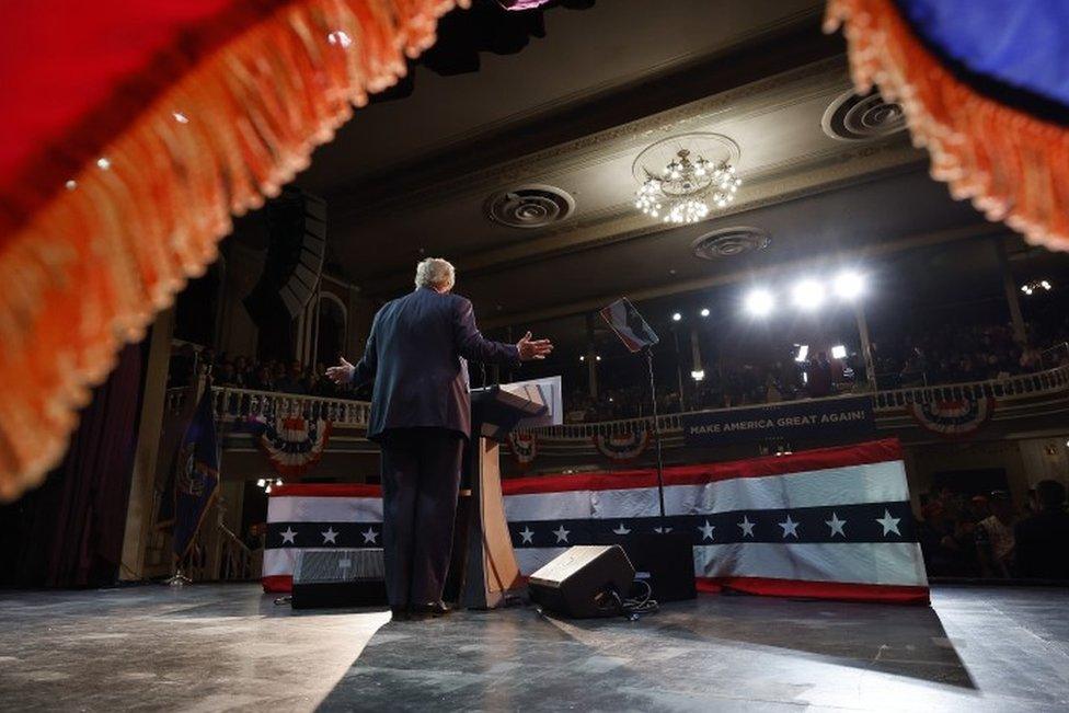 Donald Trump on stage in New Hampshire