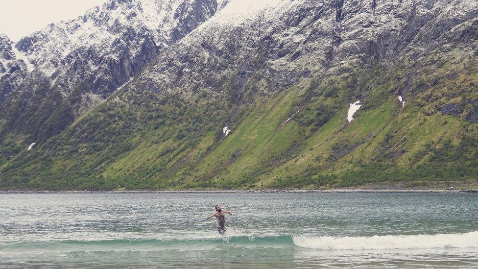 Josh swimming in Norway