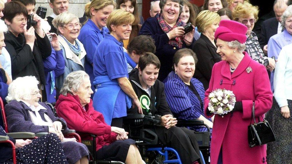 Queen Elizabeth tours the square in Portree on the Isle of Skye on 27 May 2002 as part of her Golden Jubilee tour