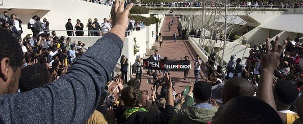 Students gather during a protest against allegations of rasicism on campus brought to light by a documentary called Luister ('listen' in Afrikaans) on September 1, 2015, in Stellenbosch