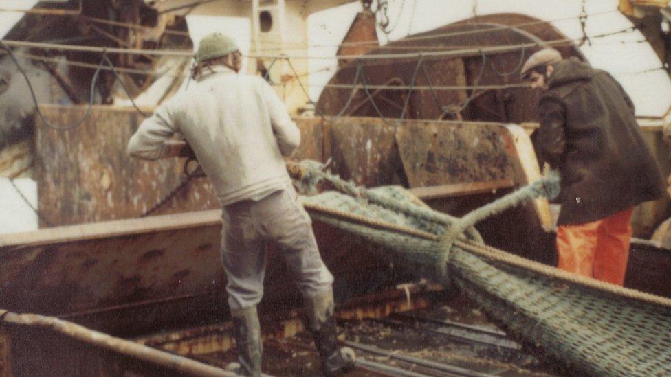 Jerry Thompson (left) on-board a trawler as a young man