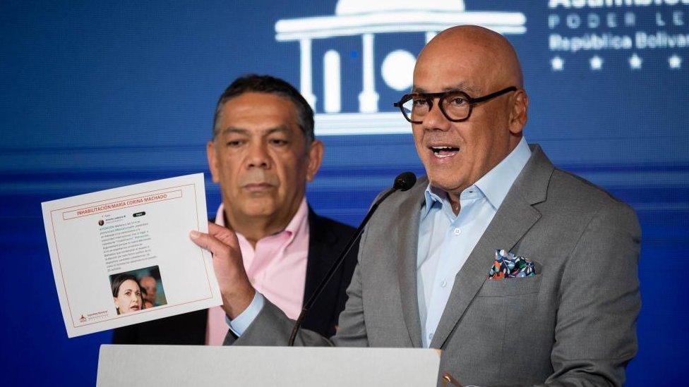 Jorge Rodriguez (R), the head of the Venezuelan government delegation in negotiations with the opposition, speaks during a press conference in Caracas, Venezuela, 29 January 2024. Rodriguez warned that his country would respond strongly if the United States reinstates or imposes new sanctions against Venezuela. Some of these sanctions were suspended for six months in October 2023.