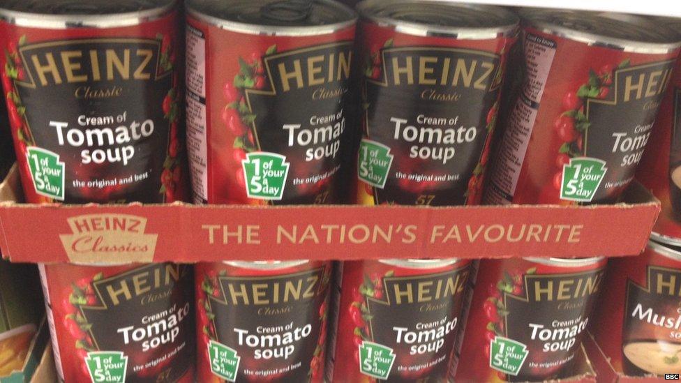 Heinz cream of tomato soup of supermarket shelf.