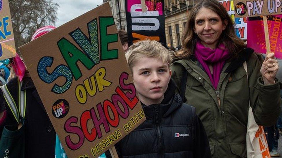 Child with placard