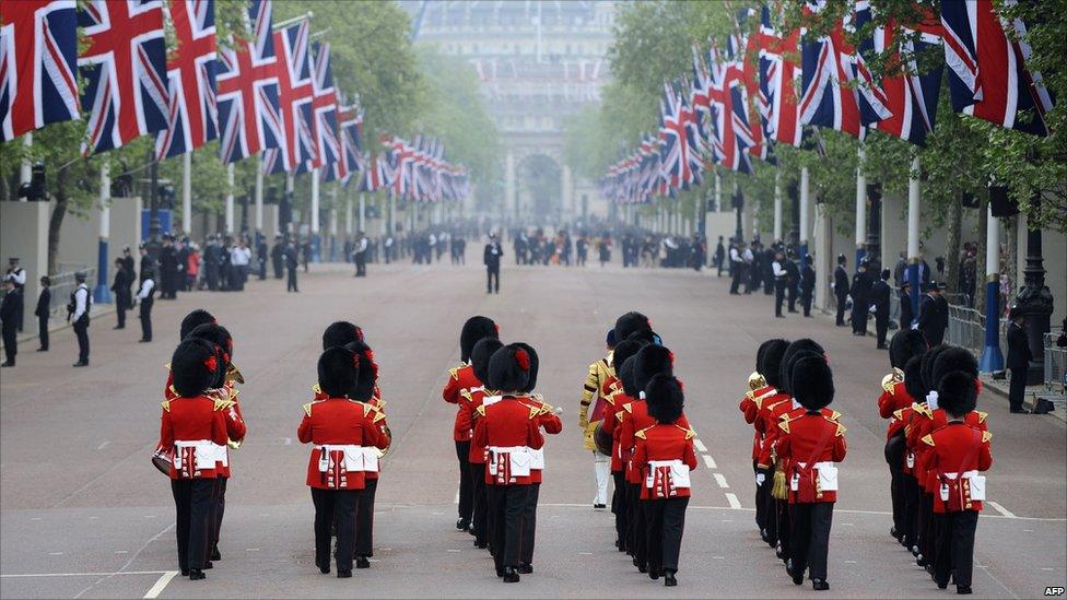 A military band perform as they march on the Mall