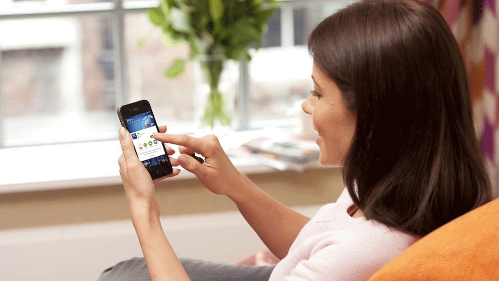 Woman using Sky Mobile