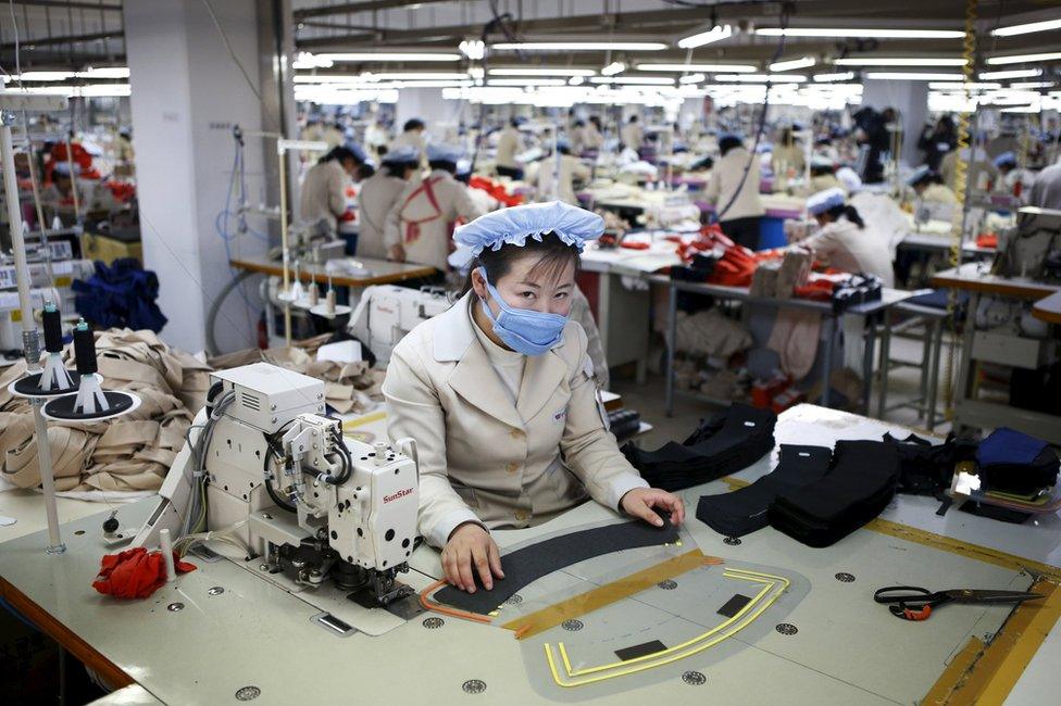 A North Korean employee works in a factory of a South Korean company at the Joint Industrial Park in Kaesong industrial zone, a few miles inside North Korea from the heavily fortified border in this 19 December 2013 file photo.