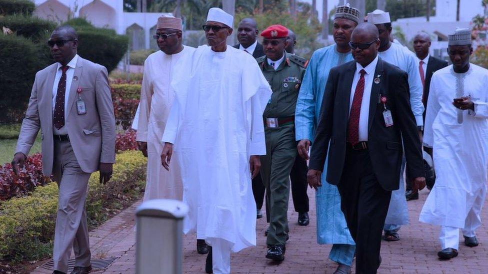 President Buhari walking in grounds of presidential palace on 5th May, 2017