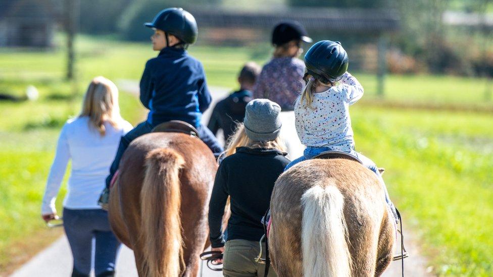 Children-horse-riding.