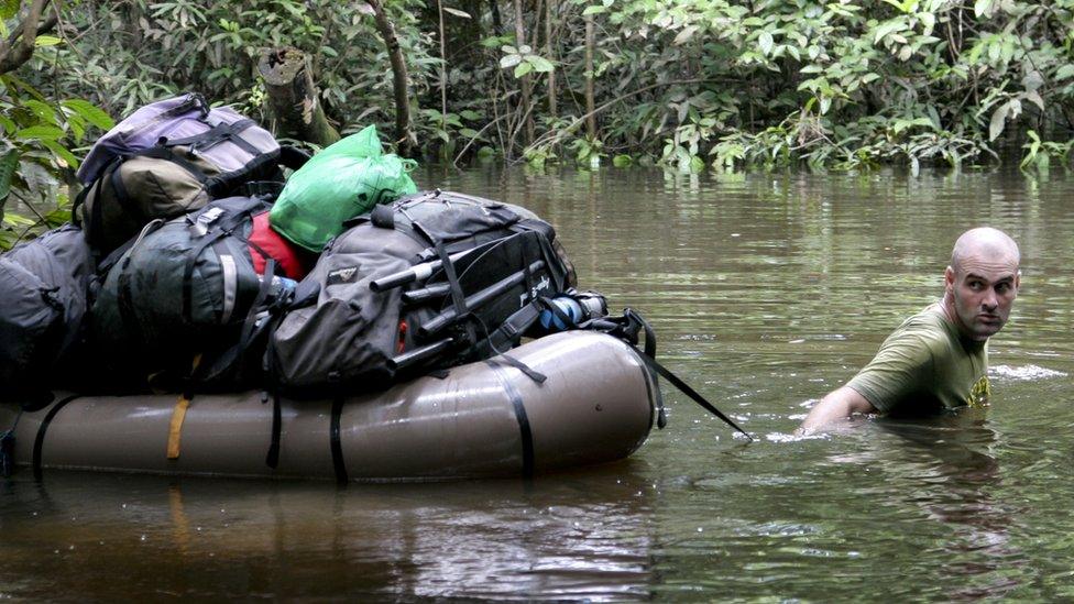 Ed Stafford pulling a boat