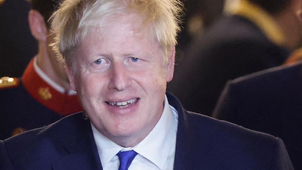 British Prime Minister Boris Johnson arrives for a family photo with NATO leaders before a Royal Gala dinner during a NATO summit in Madrid, Spain, 28 June 2022.