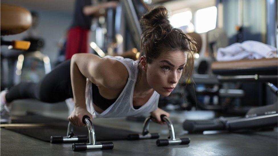 Woman working out at gym