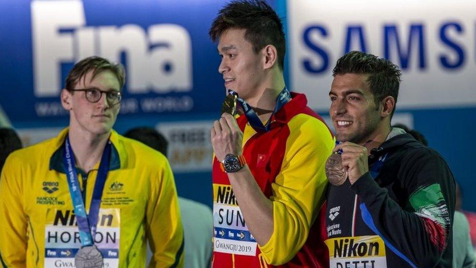 Mack Horton and Sun Yang on the podium