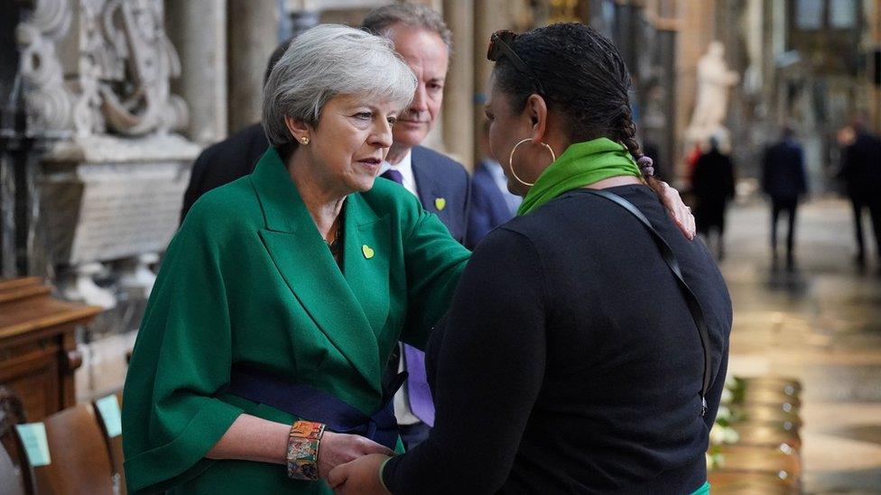 Theresa May and community volunteer Claire Walker