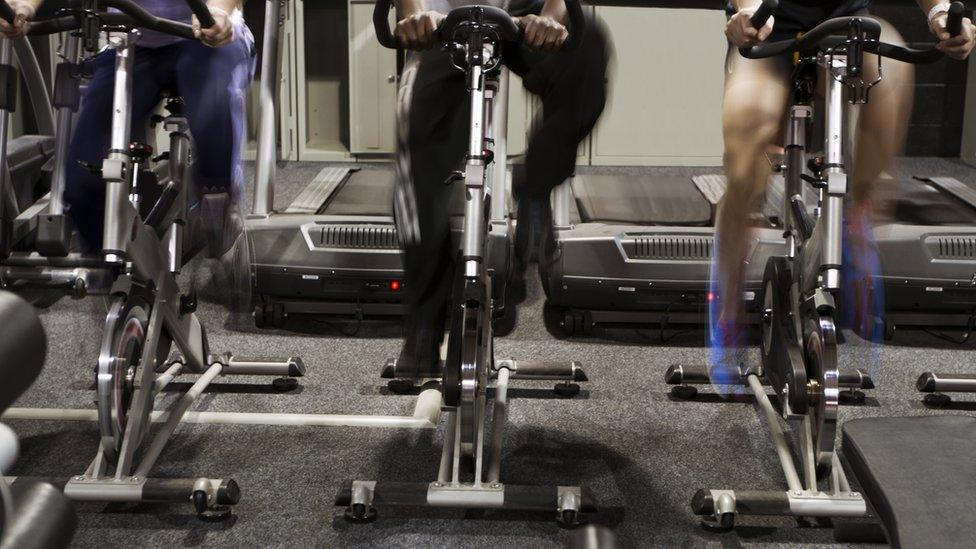 High intensity bike exercisers in a gym