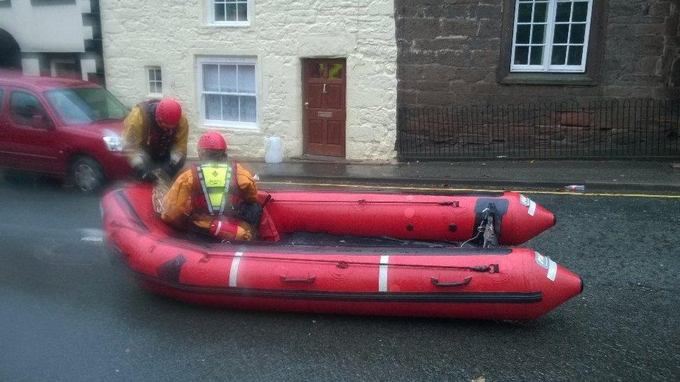 Emergency services prepare an inflatable boat in Appleby