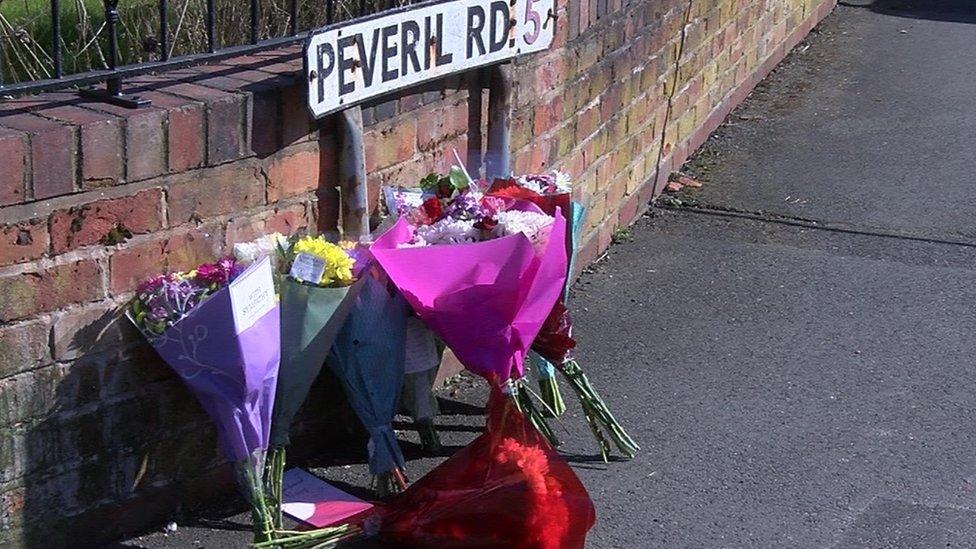 Floral tributes left in the street