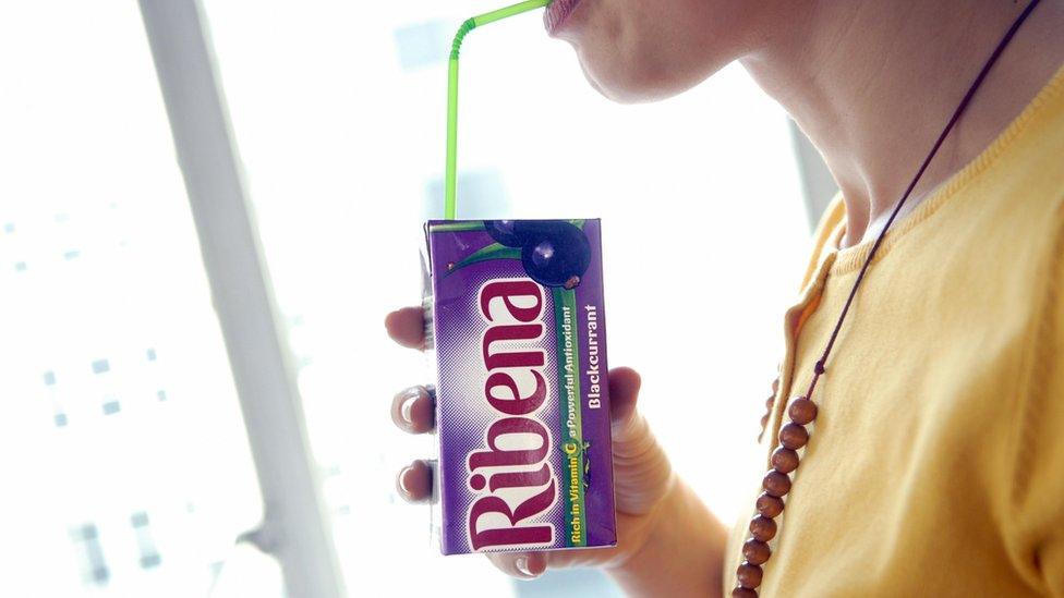 someone-drinking-from-ribena-carton