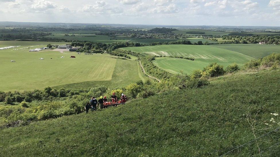 Fire crews rescuing paraglider