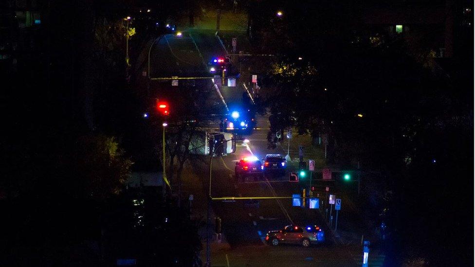 Aerial image of cordoned off scene where van overturned on Jasper avenue