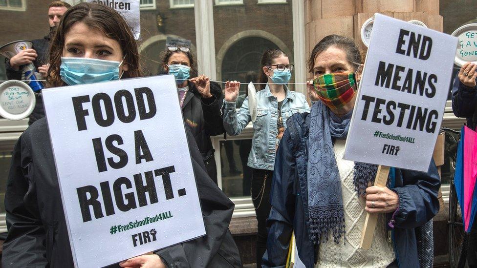 Members of the National Education Union and their supporters protest outside the Department for Education to demand free school meals for disadvantaged children during school holidays on October 29, 2020