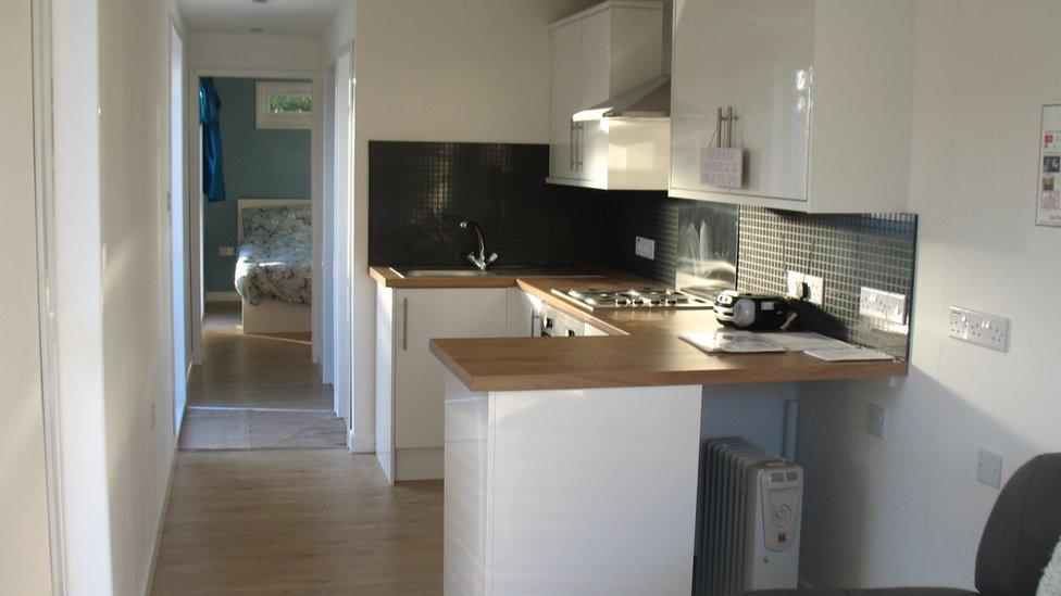 Bedroom and kitchen in converted container