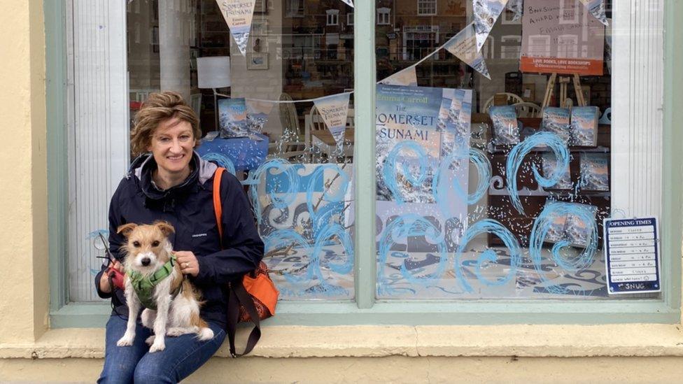 Emma outside bookshop