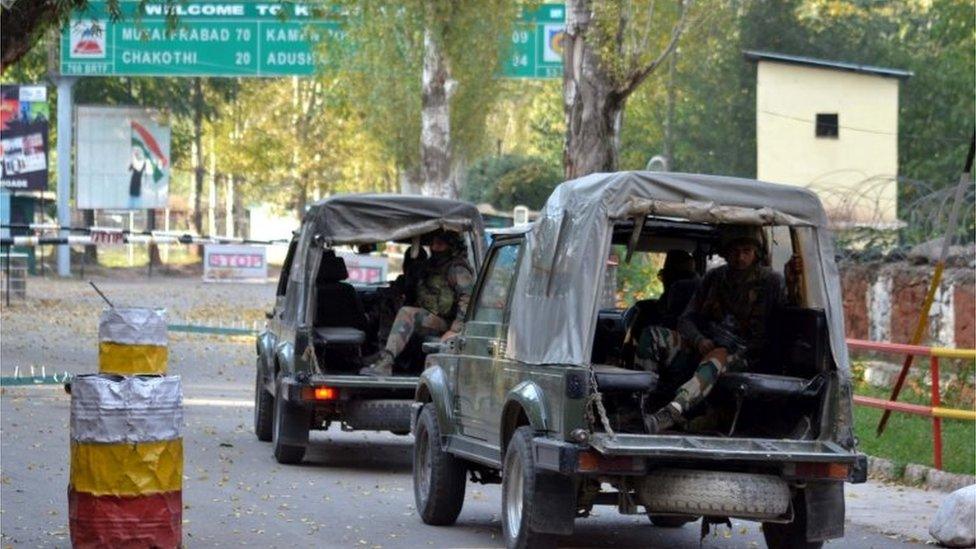 Indian soldiers enter the army base which was attacked by suspected militants in Uri, some 115 west of Srinagar, the summer capital of Indian Kashmir, 18 September 2016.