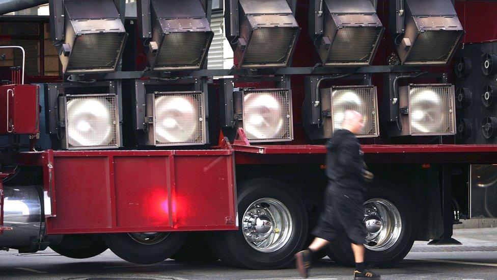 A lighting truck prepares for the filming of a mobile phone commercial on-location on November 18, 2006