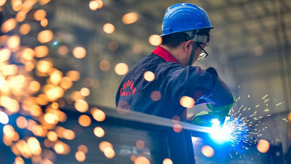 A worker welds at a temperature control equipment manufacturing enterprise in Qingzhou Economic Development Zone, East China's Shandong province.