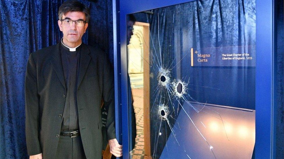 Very Reverend Nick Papadopoulos at the damaged Magna Carta display box