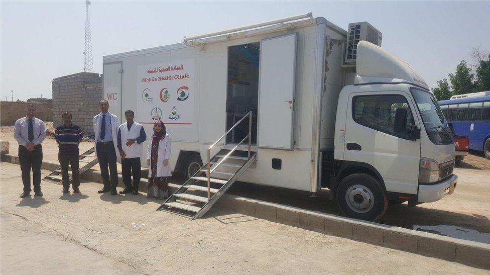 Dr Laith Al Rubaiy with colleagues at the mobile unit