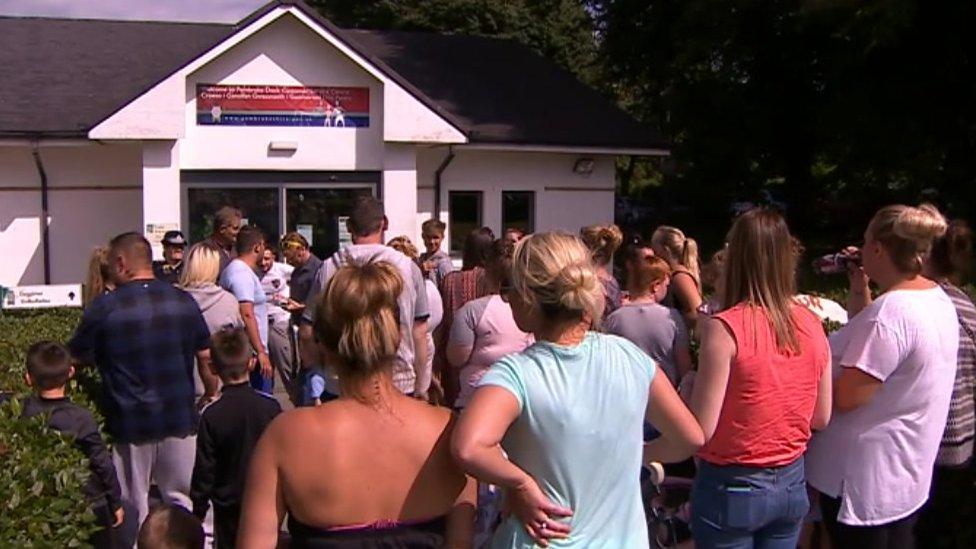 Residents protesting outside the council office