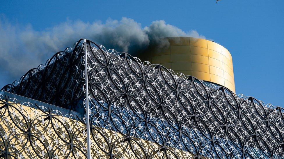 Smoke is released from Birmingham Library to represent nitrogen oxides saved by the clean air zone launched today in Birmingham