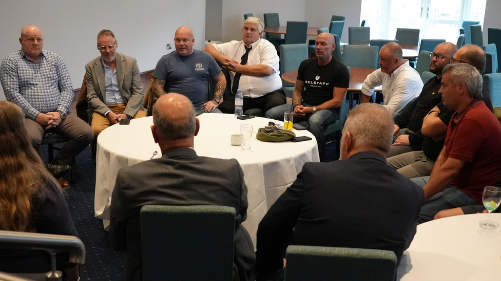 Steelworkers in meeting