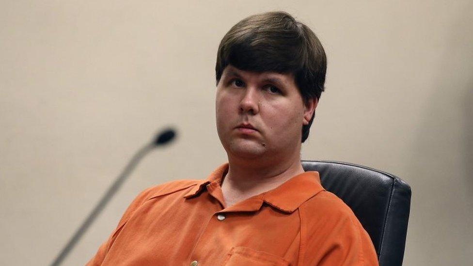 Justin Ross Harris, who prosecutors said intentionally left his 22-month-old son strapped inside a hot car to die because he wanted to live a child-free life, sits in a Georgia court.