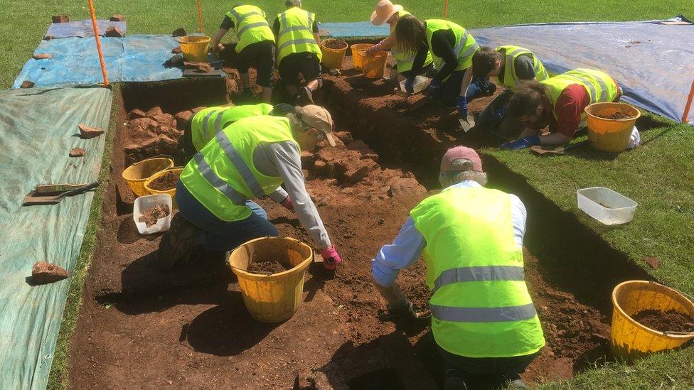 Archaeologists at dig