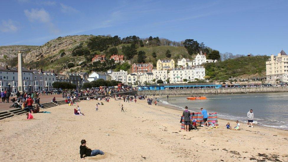 Sandy section of the beach near Llandudno Pier