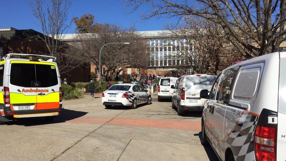 Police cars and ambulances at the Australian National University