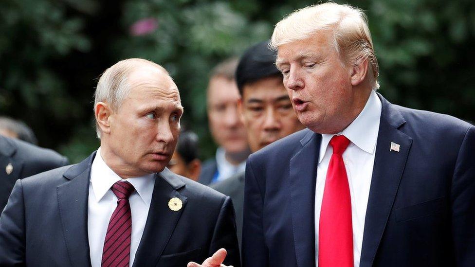 Russian President Vladimir Putin (L) with US President Donald Trump in Danang, 11 November