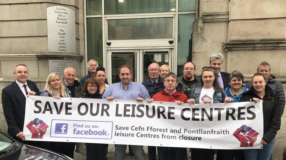 Campaigners outside the court