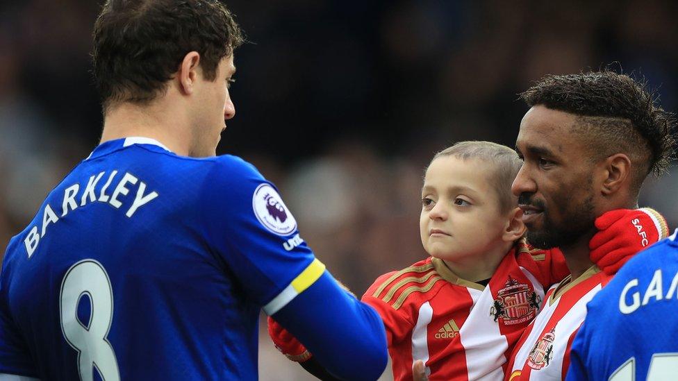 Bradley Lowery with Jermain Defoe and Ross Barkley