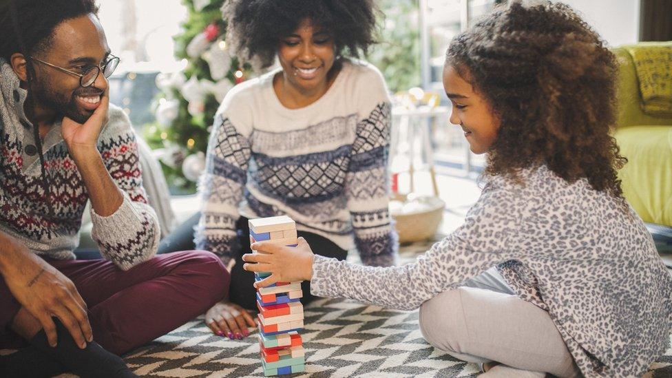 Family-playing-Christmas-games.