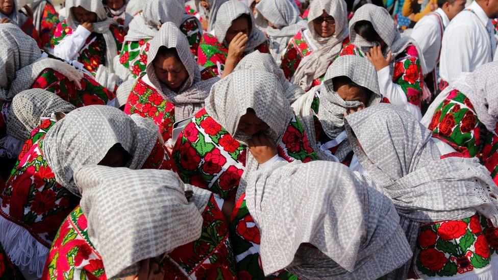 Faithful of the La Luz del Mundo (Light of the World) participate in the welcome ceremony of the "Holy Convocation" held in its temple in the city of Guadalajara